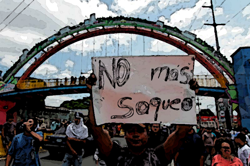 A resident of "Rubenia" neighbourhood holds a sign reading "No more looting" within the protests against the government's reforms in the Institute of Social Security (INSS), in Managua on April 22, 2018. 
Violent protests against a proposed change to Nicaragua's pension system have left at least 20 people dead, according to a local human rights body. The Nicaraguan Center for Human Rights said it was still trying to verify figures, but that at least 20 people had been killed since protests erupted in the central American country on April 18 over pension reform. / AFP PHOTO / INTI OCON