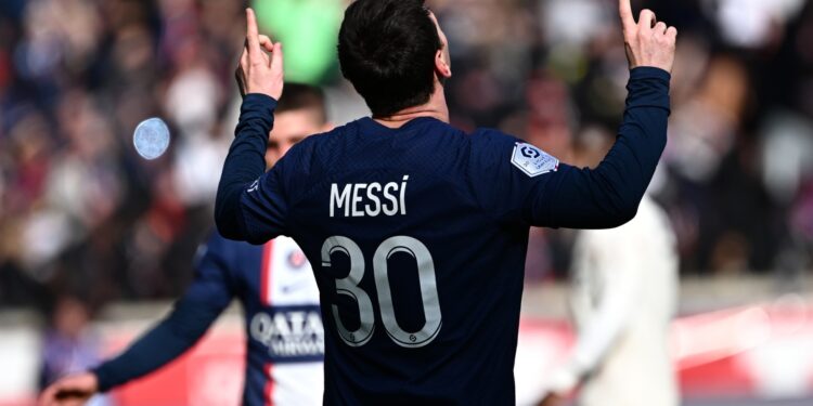Paris Saint-Germain's Argentine forward Lionel Messi celebrates scoring his team's fourth goal during the French L1 football match between Paris Saint-Germain (PSG) and Lille LOSC at The Parc des Princes Stadium in Paris on February 19, 2023. (Photo by Anne-Christine POUJOULAT / AFP)