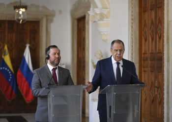 Russian Foreign Minister Sergei Lavrov (R) speaks next to his Venezuelan counterpart Yvan Gil during a press conference at the Foreign Ministry in Casa Amarilla in Caracas on April 18, 2023. (Photo by YURI CORTEZ / AFP)