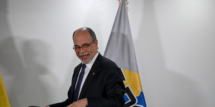 The president of Venezuela's National Electoral Council (CNE), Pedro Calzadilla, arrives to give his last press conference before resigning as a member of Venezuela's National Electoral Council (CNE) at the CNE headquarters in Caracas on June 15, 2023. - Part of the board of Venezuela's National Electoral Council (CNE), including its president Pedro Calzadilla and the rector Alexis Corredor, resigned this Thursday in order to guarantee "political stability" in view of the 2024 presidential elections, announced the head of the organization. (Photo by Federico PARRA / AFP)