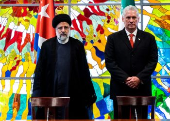 Cuba's President Miguel Diaz-Canel (R) and Iran's President Ebrahim Raisi attend the signing of bilateral agreements ceremony at the Revolution Palace in Havana on June 15, 2023. - Raisi is on a diplomatic tour of Latin America with stops in Venezuela, Nicaragua and Cuba --all the target of US sanctions. (Photo by YAMIL LAGE / AFP) / The erroneous mention[s] appearing in the metadata of this photo by YAMIL LAGE has been modified in AFP systems in the following manner: [June 15] instead of [June 14]. Please immediately remove the erroneous mention[s] from all your online services and delete it (them) from your servers. If you have been authorized by AFP to distribute it (them) to third parties, please ensure that the same actions are carried out by them. Failure to promptly comply with these instructions will entail liability on your part for any continued or post notification usage. Therefore we thank you very much for all your attention and prompt action. We are sorry for the inconvenience this notification may cause and remain at your disposal for any further information you may require.