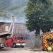 Los bomberos trabajan para extinguir un incendio que estalló en un hogar para personas discapacitadas en Wintzenheim, cerca de Colmar, este de Francia, el 9 de agosto de 2023. -