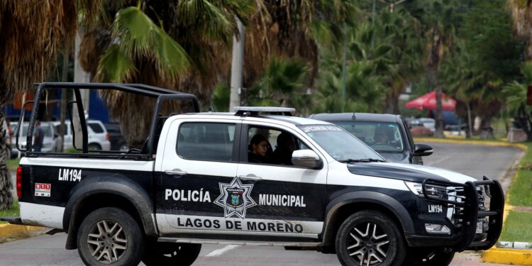 EDITORS NOTE: Graphic content / A Municipal Police vehicle patrols in Lagos de Moreno, Jalisco State, Mexico, on August 18, 2023, following the disappearance of five young men. Mexican authorities said Thursday that they had discovered human remains during a search for five young men whose disappearance and apparent brutal murder prompted shock and anger. The group of five friends, aged 19 to 22, disappeared last Friday in the western state of Jalisco, triggering a rare level of outrage in a country where kidnappings and killings are all too common. (Photo by ULISES RUIZ / AFP)