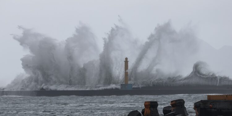 Huge waves are seen in Yilan as Typhoon Haikui makes landfall in eastern Taiwan on September 3, 2023. (Photo by I-Hwa Cheng / AFP)