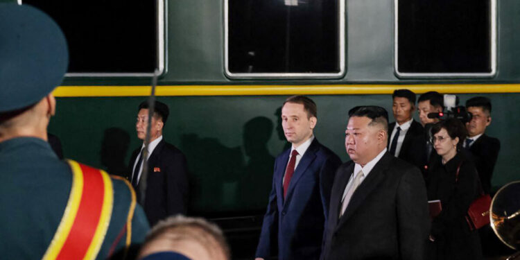 This handout photograph taken and released by Ministry of Natural Resources and Environment of Russia on September 12, 2023, shows North Korea's leader Kim Jong Un (C,R) welcomed by Russia's Minister of Natural Resources and Environment Alexander Kozlov (C) upon his arrival at Khasan train station, Primorky region, at the start of his official visit to Russia. - North Korean leader Kim Jong Un arrived in Russia on September 12, 2023 ahead of a meeting with President Vladimir Putin that the United States has warned could see an arms deal to support Moscow's assault on Ukraine. (Photo by Handout / RUSSIAN ENVIRONMENT MINISTRY / AFP) / RESTRICTED TO EDITORIAL USE - MANDATORY CREDIT "AFP PHOTO / RUSSIAN ENVIRONMENT MINISTRY" - NO MARKETING NO ADVERTISING CAMPAIGNS - DISTRIBUTED AS A SERVICE TO CLIENTS - RESTRICTED TO EDITORIAL USE - MANDATORY CREDIT "AFP PHOTO / RUSSIAN ENVIRONMENT MINISTRY" - NO MARKETING NO ADVERTISING CAMPAIGNS - DISTRIBUTED AS A SERVICE TO CLIENTS /
