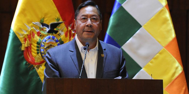 (FILES) Bolivian President Luis Arce delivers a speech during the presentation of the Interdisciplinary Group of Independent Experts (GIEI) report about the actions after Evo Morales resignation and flight due to the electoral results in October 2019, at Bolivia's Central Bank Auditorium in La Paz, on August 17, 2021. - The president of Bolivia, Luis Arce, was expelled from MAS, the party with which he won the elections in 2020, in the midst of the dispute with his former ally and now adversary Evo Morales ahead of the 2025 presidential elections, on October 4, 2023. (Photo by JORGE BERNAL / AFP)