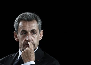 (FILES) Former French President Nicolas Sarkozy attends the 76th congress the French National Association of Chartered Accountants in Bordeaux, southwestern France, on October 8, 2021. - According to judiciary sources, Sarkozy has been indicted twice on October 6, 2023, following investigations around the Takieddine retractation. Sarkozy is being investigated over possible attempts to pressure crucial prosecution witness Ziad Takieddine, a Franco-Lebanese businessman who suddenly retracted his incriminating testimony in 2020. (Photo by Philippe LOPEZ / AFP)