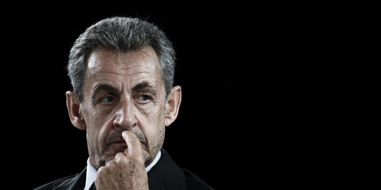 (FILES) Former French President Nicolas Sarkozy attends the 76th congress the French National Association of Chartered Accountants in Bordeaux, southwestern France, on October 8, 2021. - According to judiciary sources, Sarkozy has been indicted twice on October 6, 2023, following investigations around the Takieddine retractation. Sarkozy is being investigated over possible attempts to pressure crucial prosecution witness Ziad Takieddine, a Franco-Lebanese businessman who suddenly retracted his incriminating testimony in 2020. (Photo by Philippe LOPEZ / AFP)