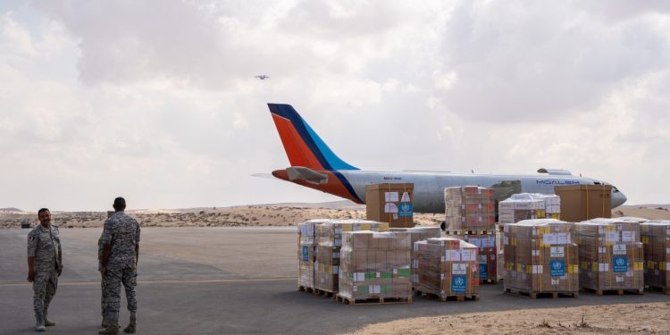 Aid supplies for Gaza provided by the World Health Organization (WHO) arrives at the Arish airport in Egypts north Sinai Peninsula on October 15, 2023. - Egypt to the south controls the only other crossing with Gaza but has so far refused to open it for Palestinian or foreign refugees unless aid convoys are allowed to enter, according to unnamed intelligence sources cited in media reports. (Photo by Ali Moustafa / AFP)