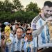 Soccer fans wearing Argentina's football team jersey cheer outside the Workers' Stadium ahead of a friendly match between Australia and Argentina in Beijing on June 15, 2023. (Photo by Jade Gao / AFP)