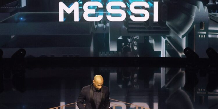 Thierry Henry collects The Best FIFA Men's Player award on behalf of Argentina and Inter Miami forward Lionel Messi during the Best FIFA Football Awards 2023 ceremony in London on January 15, 2024. (Photo by Adrian DENNIS / AFP)