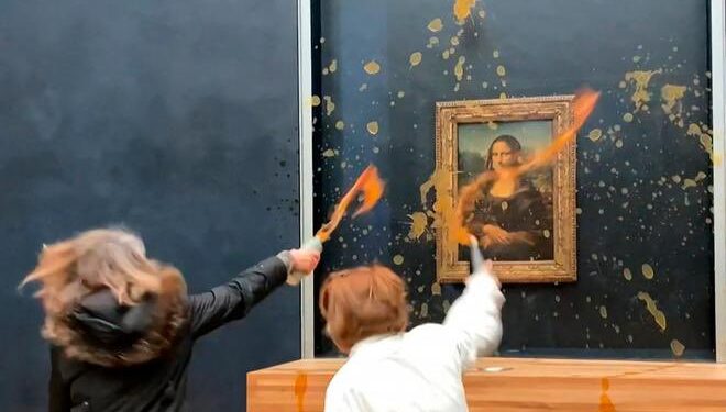 Ecologistas rocían de sopa el cristal que protege la "Mona Lisa" en el Louvre