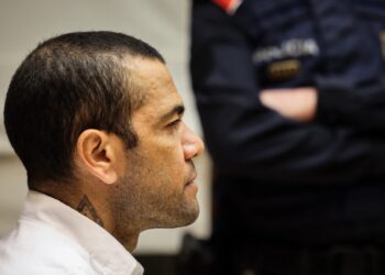 (FILES) Brazilian footballer Dani Alves looks on at the start of his trial at the High Court of Justice of Catalonia in Barcelona, on February 5, 2024. - Ex-Brazil star Dani Alves has been sentenced to 4.5 years in jail for rape, Barcelona's court announced on February 22, 2024. (Photo by Jordi BORRAS / POOL / AFP)