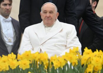 Pope Francis looks on during his weekly open air general audience in the Saint Peters' Square at the Vatican on April 3, 2024. (Photo by Alberto PIZZOLI / AFP)