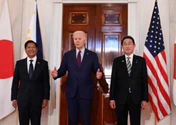 US President Joe Biden speaks to the press with Japanese Prime Minister Fumio Kishida (R) and Filipino President Ferdinand Marcos Jr. (L) at the White House in Washington, DC, April 11, 2024. (Photo by ANDREW CABALLERO-REYNOLDS / AFP )
